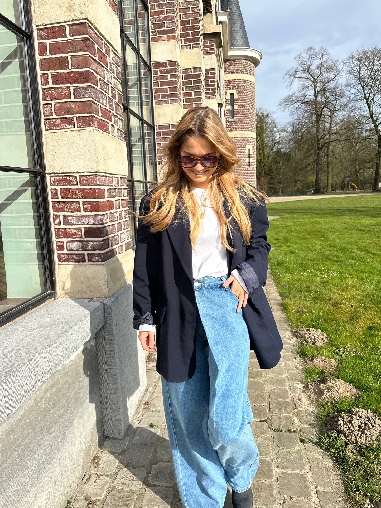 Dark blue oversized blazer with open back